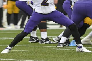 Huntley at practice for Ravens but Jackson isn t AP News